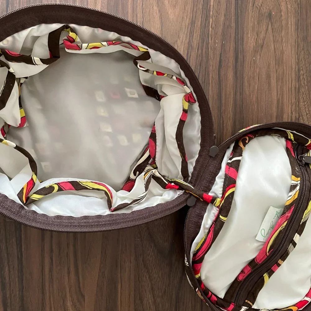 Red, Yellow, and Brown Patterned Vera Bradley Circle Travel Bag
